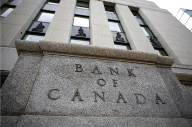 Loonie rises as national bank holds the line on interest rates