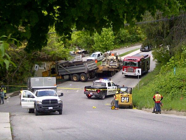 UPDATED: Nelson Police release age of Selkirk Paving employee pinned under truck during industrial accident Friday