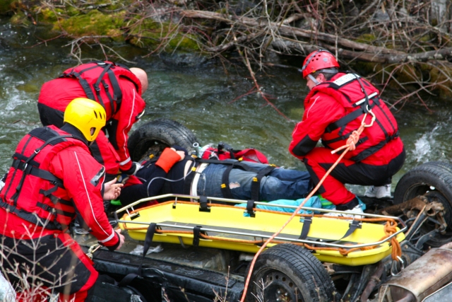 BREAKING NEWS: Man rescued from his overturned SUV in creek outside Christina Lake