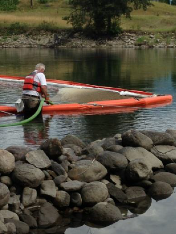 Booms removed from Kootenay and Lower Slocan Rivers; 18 locals hired after yesterday's job fair