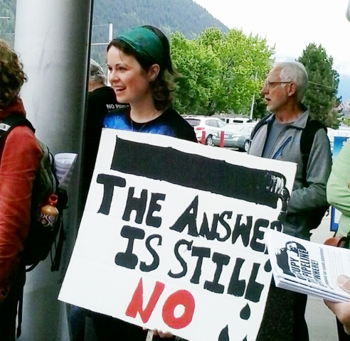 Opponents of Enbridge Northern Gateway pipeline rally at Chahko Mika Mall