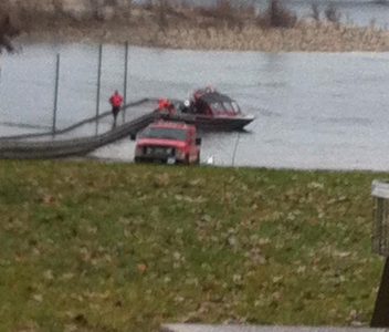 Car submerged in river; police welcome public input