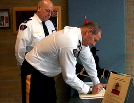 Coquitlam RCMP invite the public to sign a condolence book for Const. David Wynn 