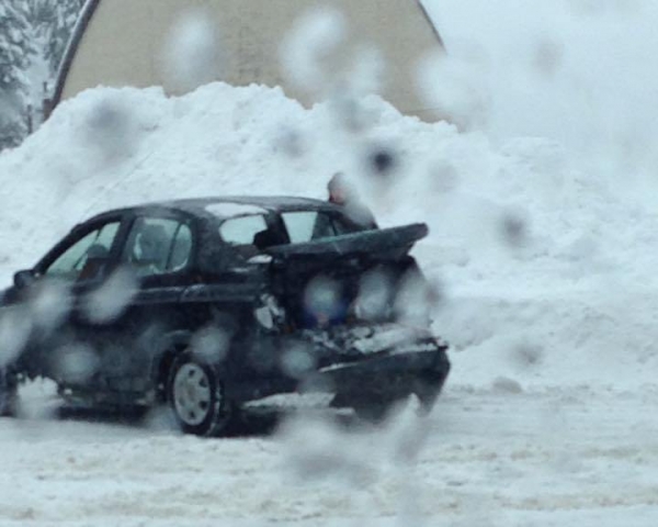 Man injured after vehicle struck by snow plow