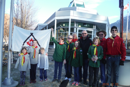 Scouts raise flag at City Hall to honour program founder