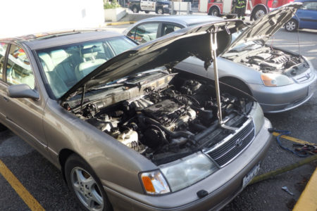 No one injured as car engine catches fire in Credit Union parking lot