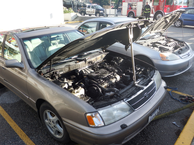 No one injured as car engine catches fire in Credit Union parking lot