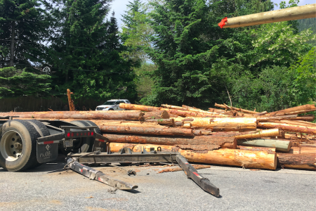 Logging truck accident slows traffic on Highway 3A