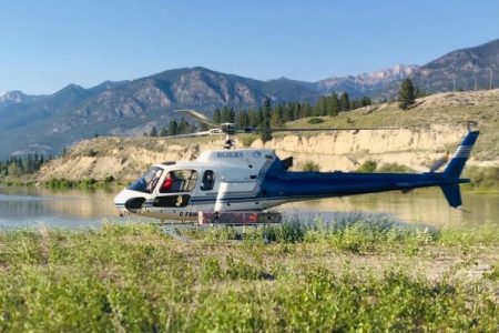 Mountie and paddle boarder extracted by helicopter after heroic river rescue