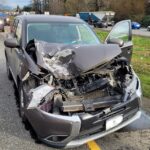 BC Highway Patrol charges dump truck driver after the wheels fall off and hit another vehicle